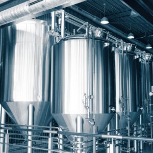 large,reservoirs,,tanks,and,pipes,with,manometers,in,private,microbrewery.