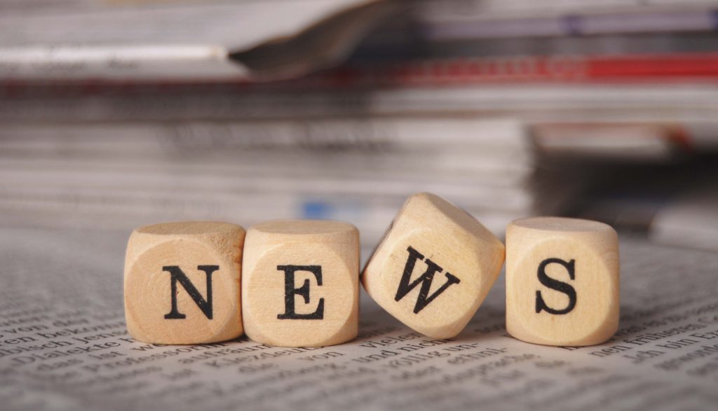 the,word,news,on,cubes,on,a,newspaper