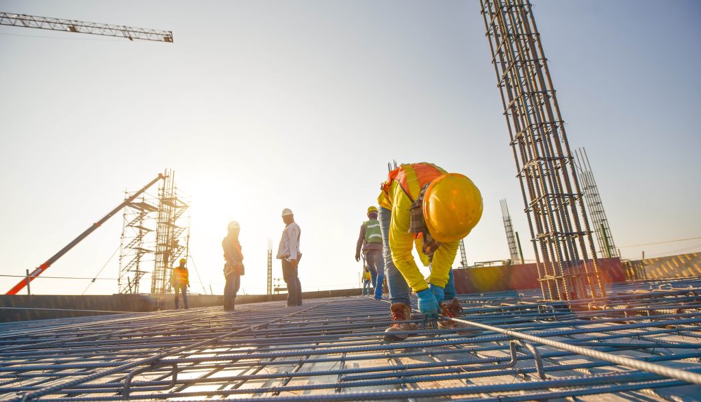 construction,workers,fabricating,steel,reinforcement,bar,at,the,construction,site